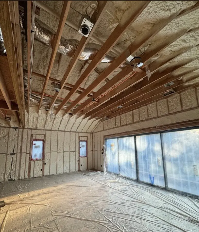 Interior walls and ceiling insulated with spray foam during new construction in San Anselmo